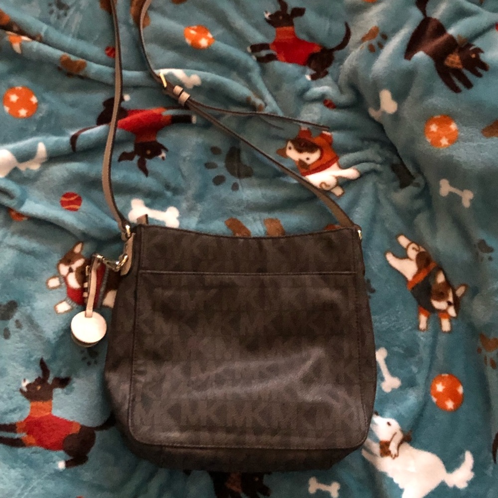 Michael Kors crossbody messenger bag.